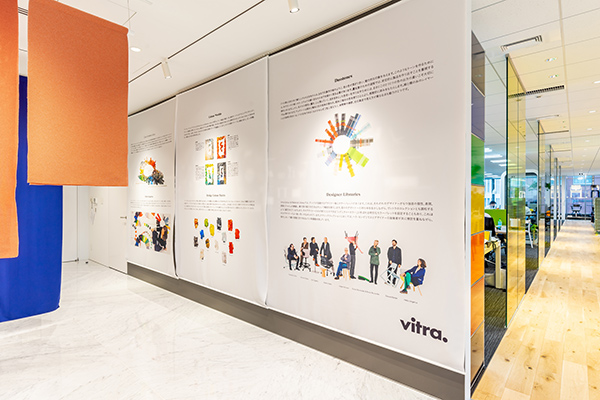 中央のイベントスペース、先ほどの反対側、入って左側の執務スペースへ進んでいく。写真の中央のポスターはヴィトラの企画展パネル。